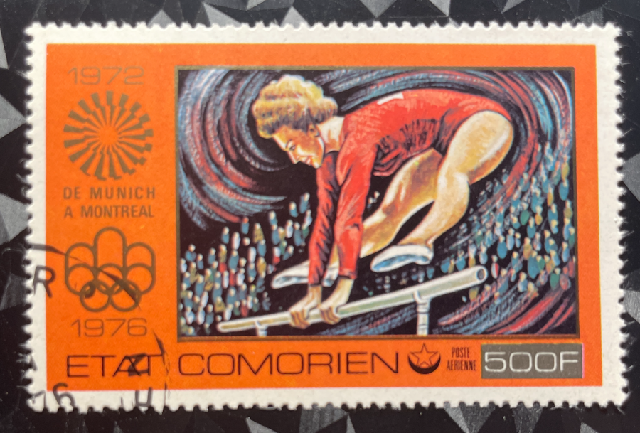 Timbre de poste aérienne représentant la gymnastique artistique féminine sur barres asymétriques (Série des Jeux Olympiques de Munich 1972 à Montréal 1976)