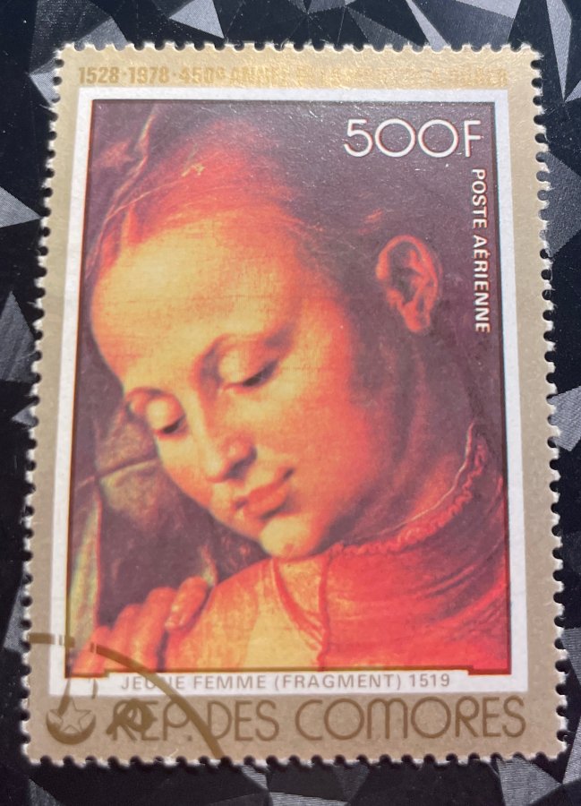 Timbre de poste aérienne commémorant les 450 ans de la mort d'Albrecht Dürer – Jeune femme (fragment)